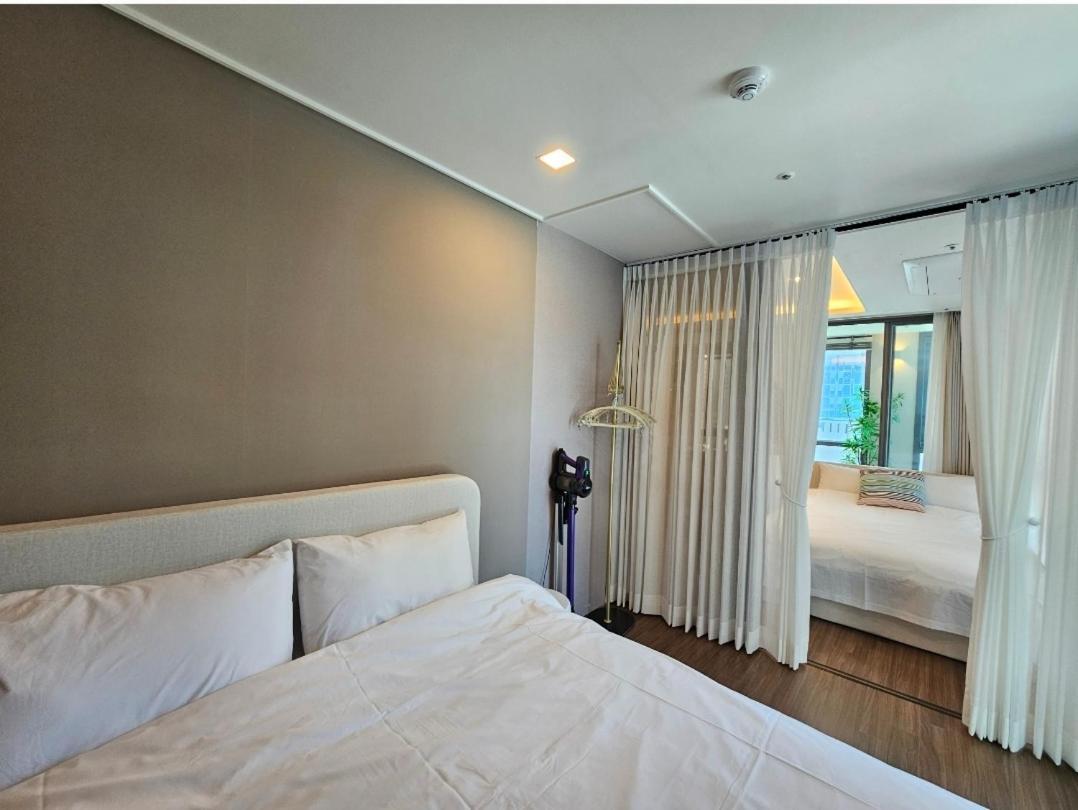 Haeundae Ocean Family Apartman Puszan Szoba fotó